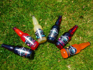 Brix Soda bottles in the grass